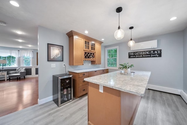 80 E St, Pepperell, MA 01463 - kitchen with beverage cooler, light wood-style floors, plenty of natural light, and recessed lighting