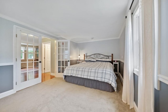 80 E St, Pepperell, MA 01463 - bedroom with french doors, carpet flooring, and crown molding