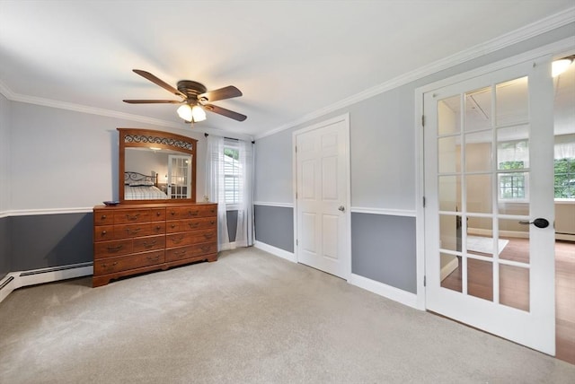 80 E St, Pepperell, MA 01463 - unfurnished bedroom featuring ornamental molding, carpet flooring, ceiling fan, and baseboard heating