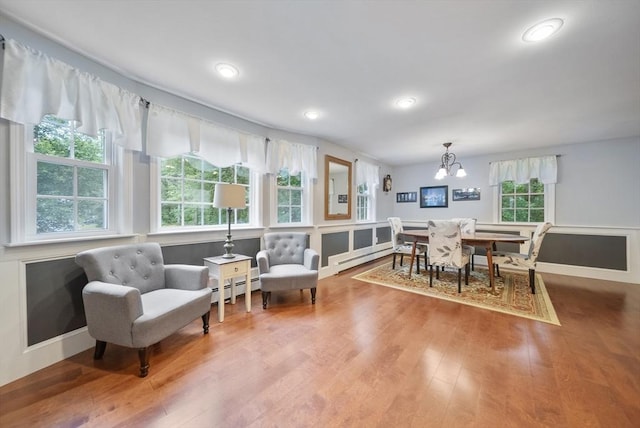 80 E St, Pepperell, MA 01463 - dining space with baseboard heating, wood finished floors, healthy amount of natural light, and recessed lighting