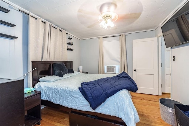 276 Oak St, Springfield, MA 01151 - bedroom with wood finished floors, cooling unit, and a ceiling fan