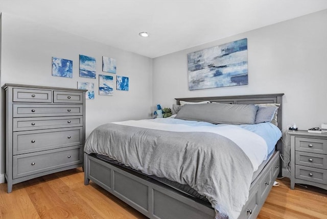 bedroom with light wood-style flooring