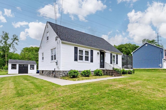 151 Labelle St, West Springfield, MA 01089 - view of front of home featuring an outbuilding, a front lawn, and roof with shingles