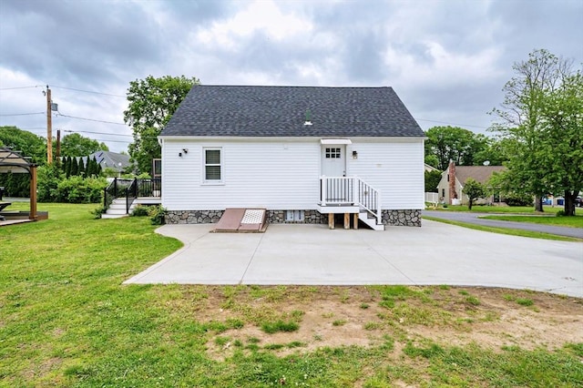 151 Labelle St, West Springfield, MA 01089 - back of property with a lawn, roof with shingles, a patio area, and a wooden deck
