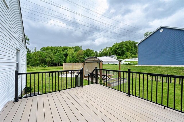 151 Labelle St, West Springfield, MA 01089 - wooden terrace featuring a lawn