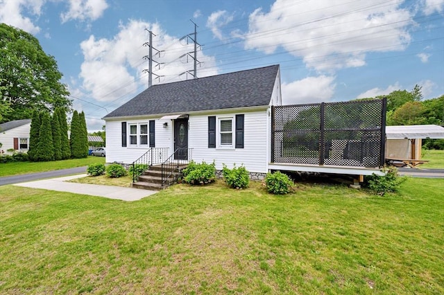 151 Labelle St, West Springfield, MA 01089 - new england style home featuring a shingled roof and a front lawn