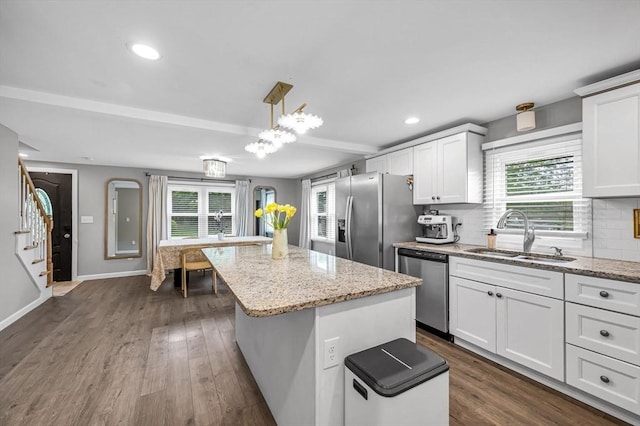151 Labelle St, West Springfield, MA 01089 - kitchen with a sink, stainless steel appliances, a kitchen island, healthy amount of natural light, and recessed lighting