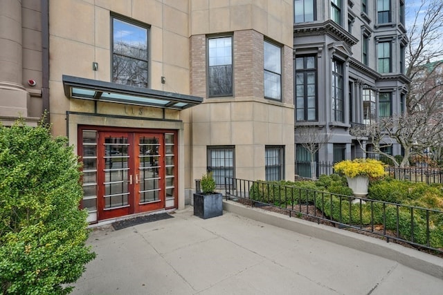 doorway to property featuring french doors