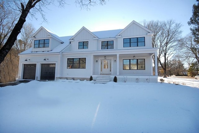 modern farmhouse style home with a garage and a porch