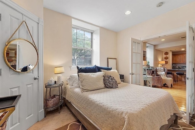 110 O St Unit 1, Boston, MA 02127 - bedroom featuring recessed lighting, light wood-style floors, and french doors