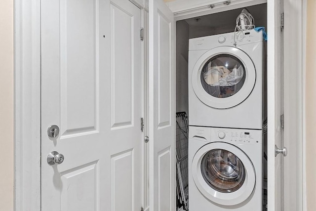 110 O St Unit 1, Boston, MA 02127 - laundry room featuring stacked washer / dryer and laundry area