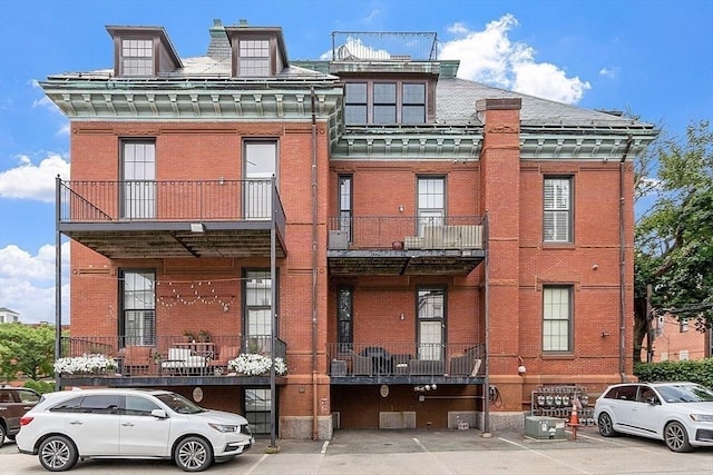 110 O St Unit 1, Boston, MA 02127 - view of building exterior with uncovered parking