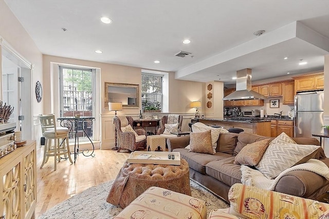 110 O St Unit 1, Boston, MA 02127 - living room with light wood-style floors, visible vents, and recessed lighting