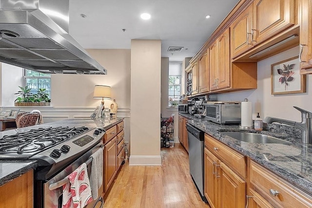 110 O St Unit 1, Boston, MA 02127 - kitchen with ventilation hood, a toaster, stainless steel appliances, a sink, and light wood-type flooring