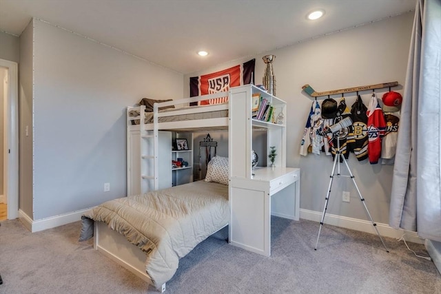 bedroom featuring light colored carpet