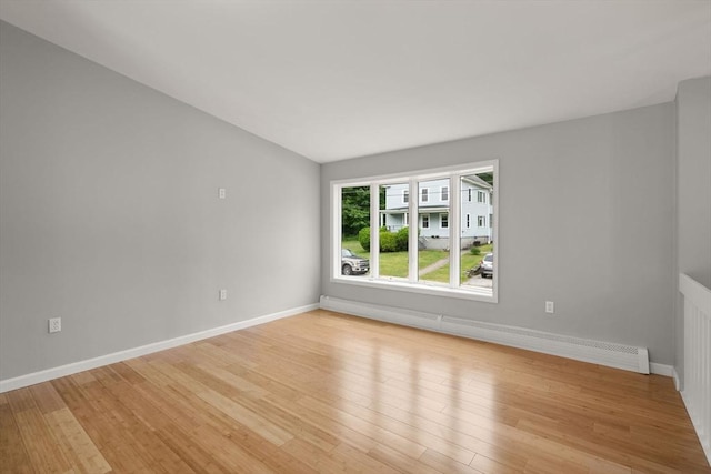 29 Hudson Ave, Southbridge, MA 01550 - unfurnished room with a baseboard radiator, light wood finished floors, and baseboards