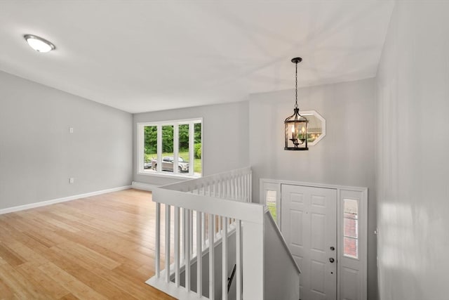 29 Hudson Ave, Southbridge, MA 01550 - entrance foyer featuring a chandelier, light wood-style floors, and baseboards