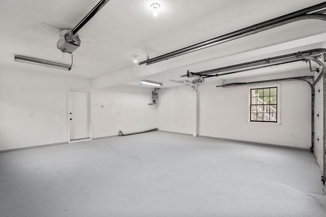 29 Hudson Ave, Southbridge, MA 01550 - garage featuring a garage door opener