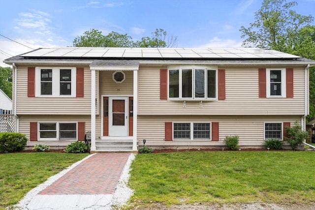 29 Hudson Ave, Southbridge, MA 01550 - raised ranch with a front lawn and solar panels