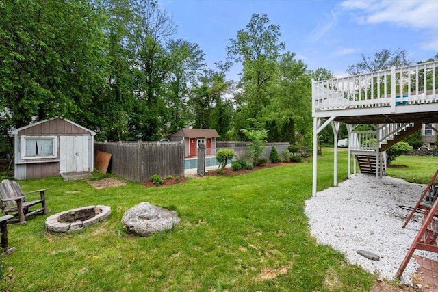 29 Hudson Ave, Southbridge, MA 01550 - view of yard featuring a fire pit, a wooden deck, and stairs