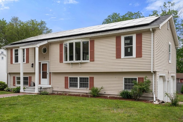 29 Hudson Ave, Southbridge, MA 01550 - bi-level home featuring roof mounted solar panels and a front yard