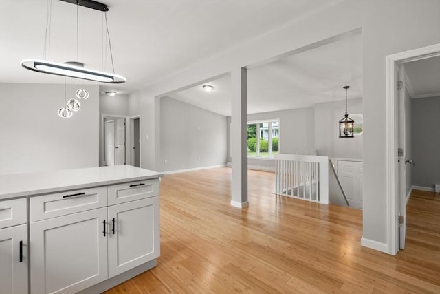 29 Hudson Ave, Southbridge, MA 01550 - hall with an upstairs landing, light wood-style floors, and baseboards