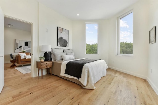 bedroom featuring light hardwood / wood-style flooring