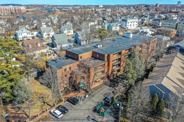 birds eye view of property with a residential view