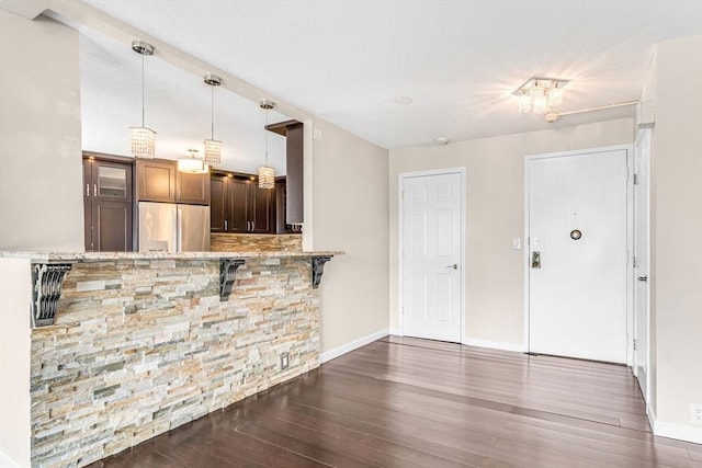 280 Boylston St Unit 511, Newton, MA 02467 - kitchen featuring stainless steel refrigerator, dark wood-style floors, and baseboards