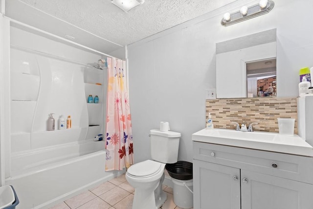 full bathroom with vanity, backsplash, tile patterned floors, toilet, and shower / bath combo with shower curtain