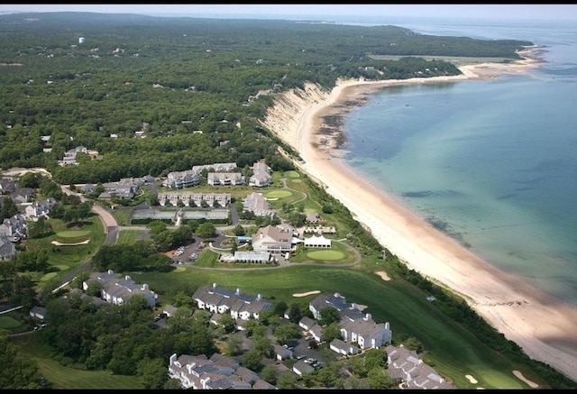 bird's eye view featuring a beach view and a water view