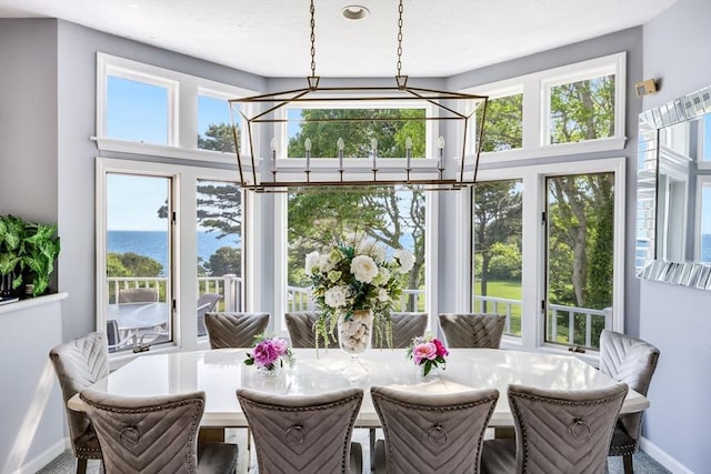 461 Wings Neck Rd, Bourne, MA 02559 - sunroom / solarium featuring a chandelier and a water view
