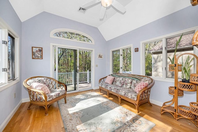 sunroom / solarium featuring visible vents and a healthy amount of sunlight