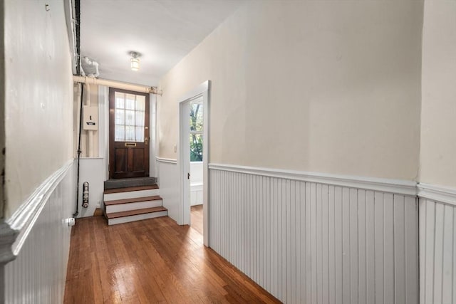8 Browne St Unit 1, Brookline, MA 02446 - doorway with a wainscoted wall and hardwood / wood-style floors