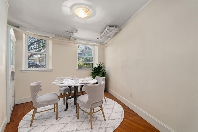 8 Browne St Unit 1, Brookline, MA 02446 - dining area featuring baseboards and wood finished floors