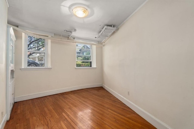 8 Browne St Unit 1, Brookline, MA 02446 - unfurnished room with baseboards and wood finished floors