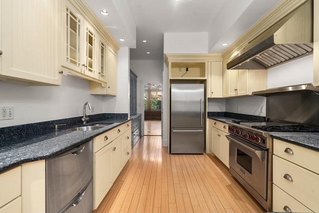 8 Browne St Unit 1, Brookline, MA 02446 - kitchen featuring premium appliances, cream cabinets, and a sink