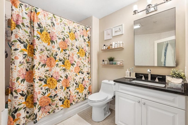 519 Harrison Ave Unit 314, Boston, MA 02118 - bathroom featuring vanity, toilet, shower / tub combo, and tile patterned flooring