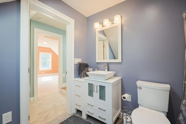 211 Hayden Rowe St, Hopkinton, MA 01748 - bathroom featuring vanity and vaulted ceiling