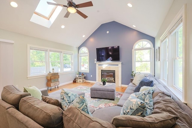211 Hayden Rowe St, Hopkinton, MA 01748 - living area with plenty of natural light, vaulted ceiling, light wood-type flooring, ceiling fan, and recessed lighting