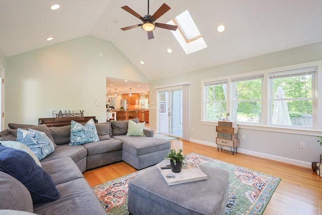 211 Hayden Rowe St, Hopkinton, MA 01748 - living room with a skylight, a ceiling fan, healthy amount of natural light, recessed lighting, and light wood-style floors