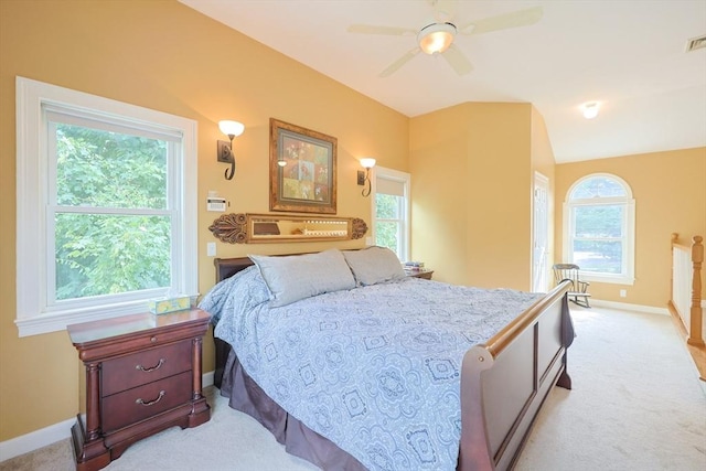 211 Hayden Rowe St, Hopkinton, MA 01748 - bedroom with light colored carpet, multiple windows, and a ceiling fan