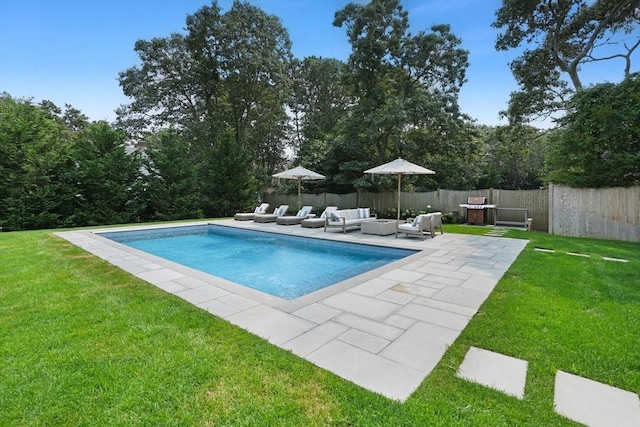 view of swimming pool with outdoor lounge area and a patio area
