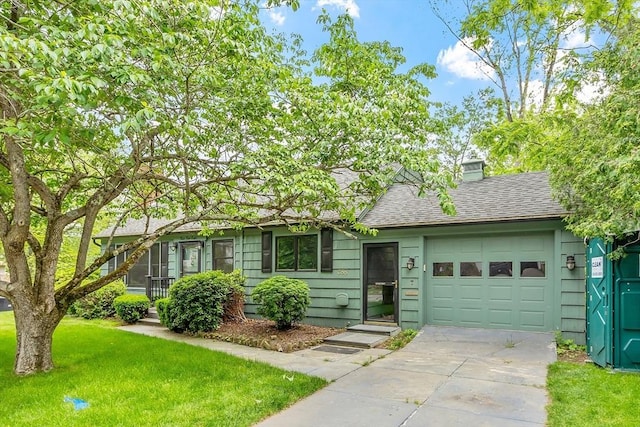 358 Salem St Unit 358, Haverhill, MA 01835 - view of front of house with an attached garage, a front lawn, concrete driveway, roof with shingles, and a chimney