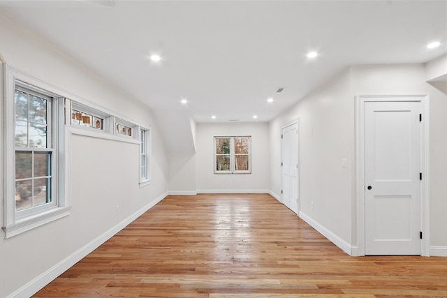 bonus room featuring light hardwood / wood-style floors