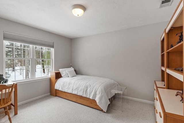 bedroom with multiple windows