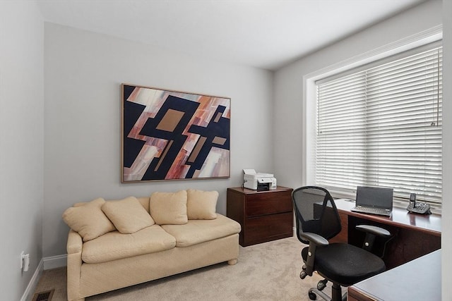 view of carpeted office space