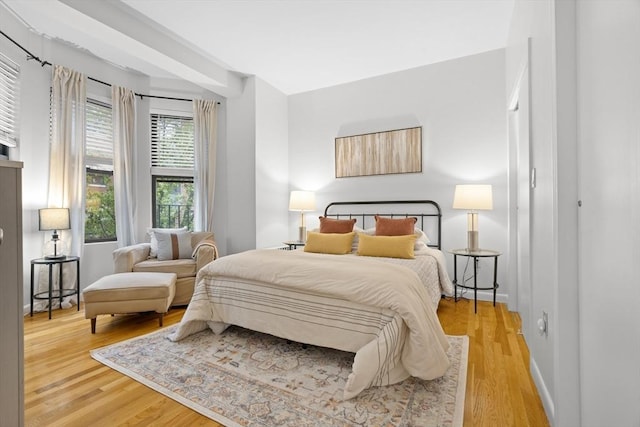 bedroom with wood finished floors