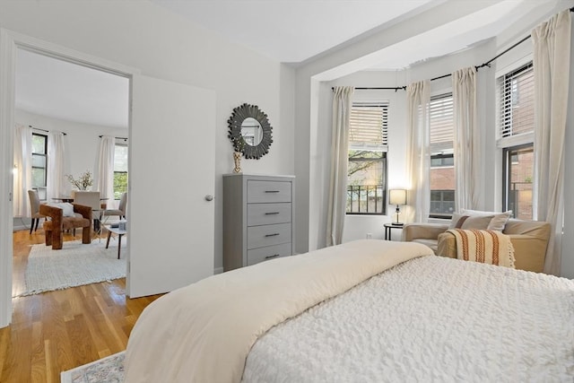 bedroom with light wood-style floors