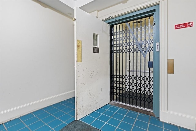 view of tiled foyer entrance